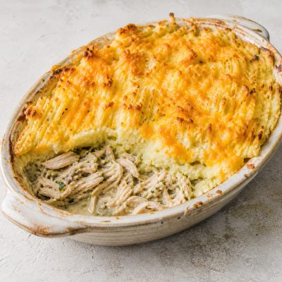 Roast chicken pie with golden mashed vegetable topping