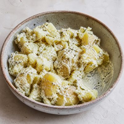 Soft crushed potatoes in a creamy mint dressing